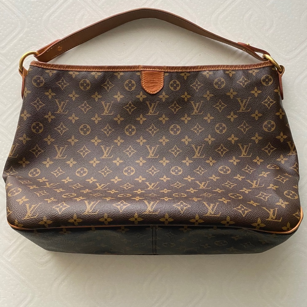 LOUIS VUITTON - Monogrammed brown canvas/leather.
